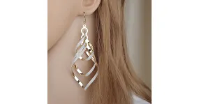 Boucles d'oreilles longues à pompon 2 modèles